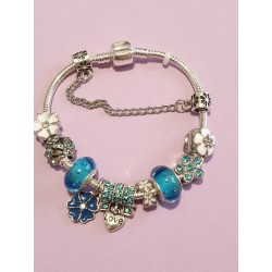 Bracciale donna sterling ( argento laminato), 925 marchiato tema  fiorellini e turchesi, completo di charms come in foto