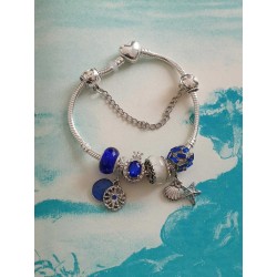 Bracciale donna sterling ( argento laminato), 925 marchiato completo di charms come in foto molto bello leggero ed al te